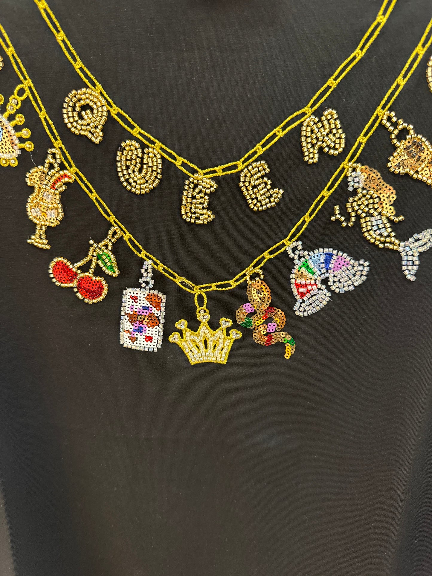 Queen Of Sparkles Black Queen &
Icon Necklaces Charm Tee
Dress