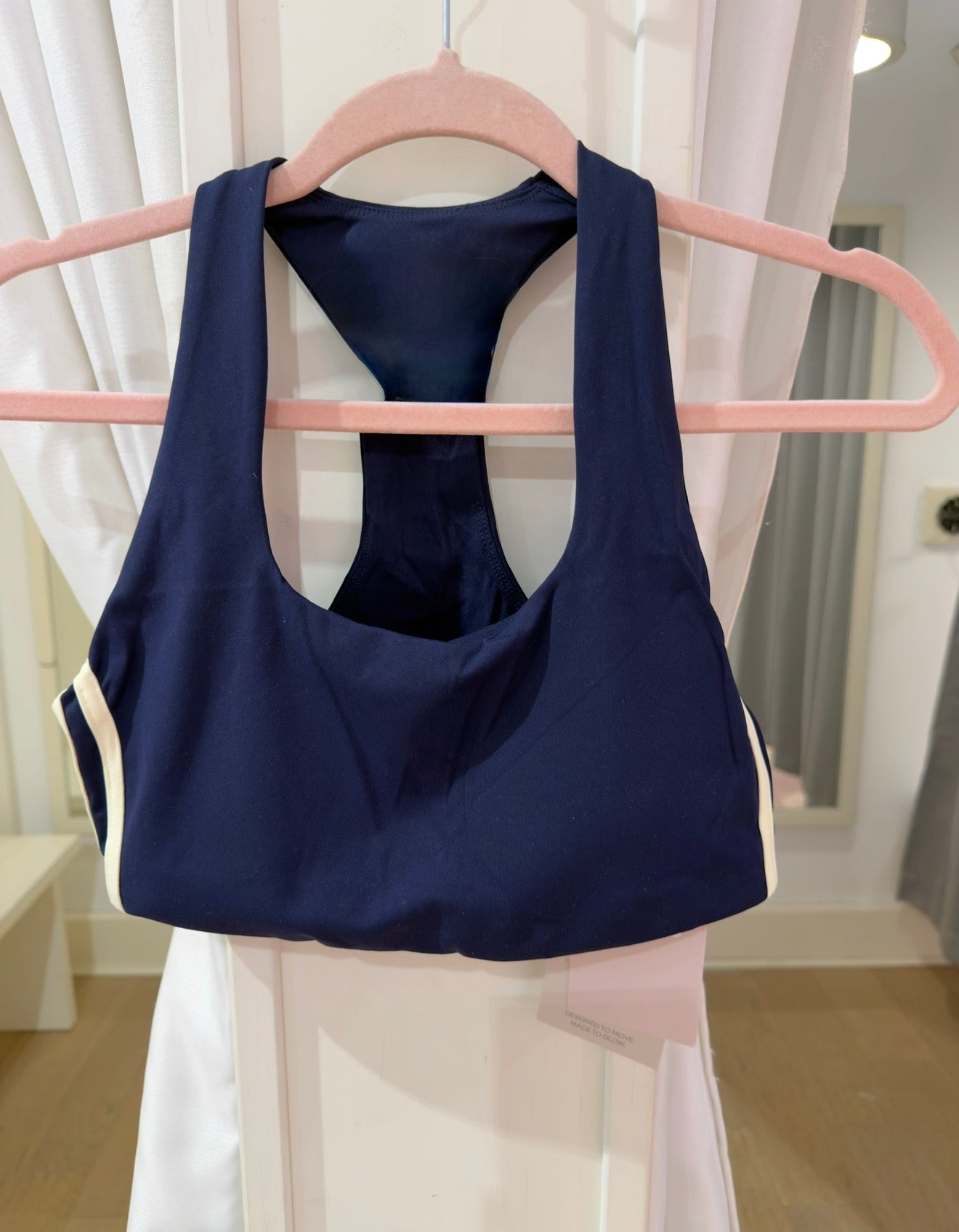 The Calera athletic top in dark navy with stripes