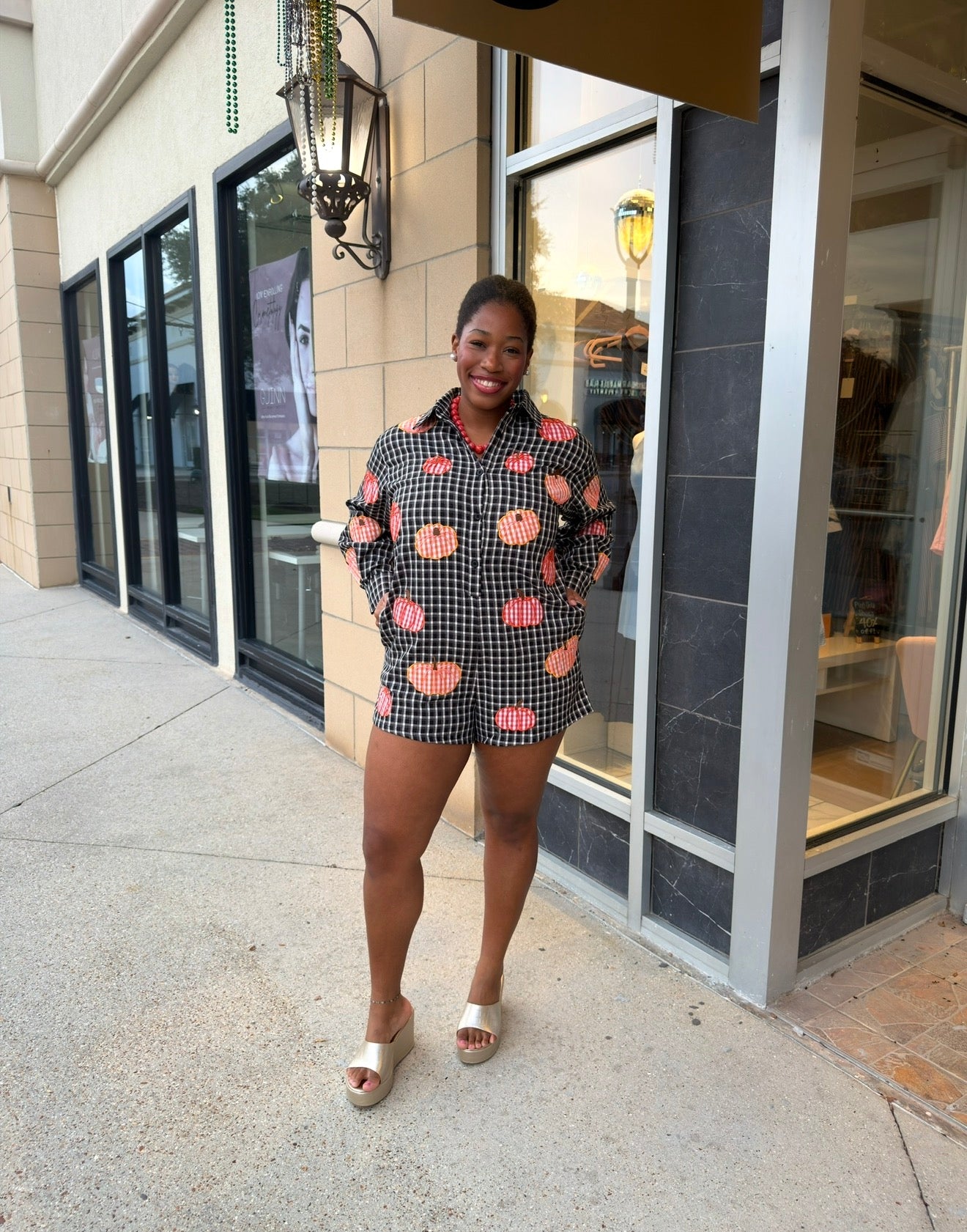 Queen of Sparkles Black & Orange Gingham Pumpkin Button Up Romper