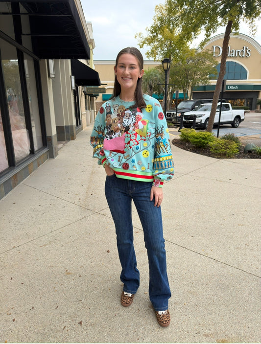 Queen of sparkles aqua dogs on Santa’s sleigh sweatshirt