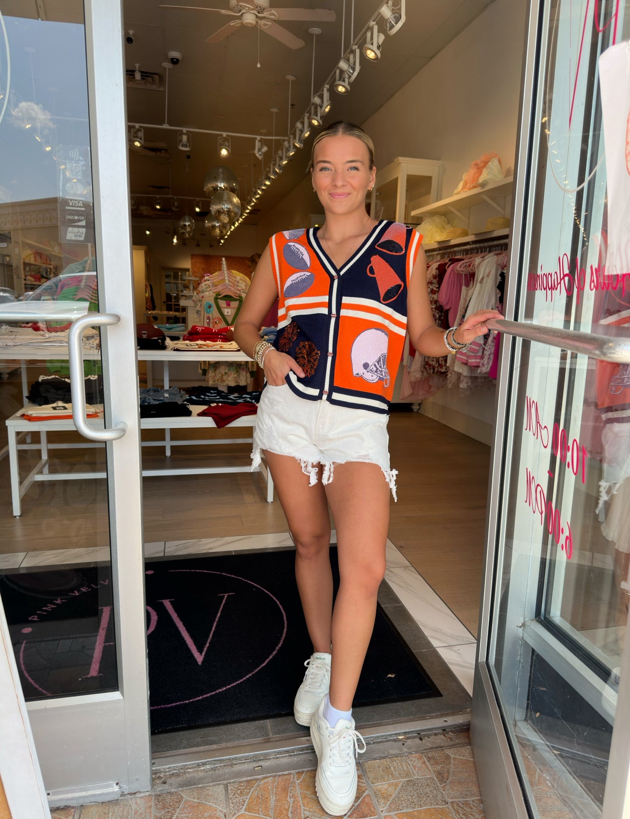 Queen of Sparkles Football Icon Sweater Vest in navy and orange